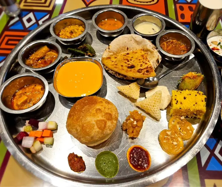 Hog on these Thalis in Pune with Unlimited Aamras this Summer!