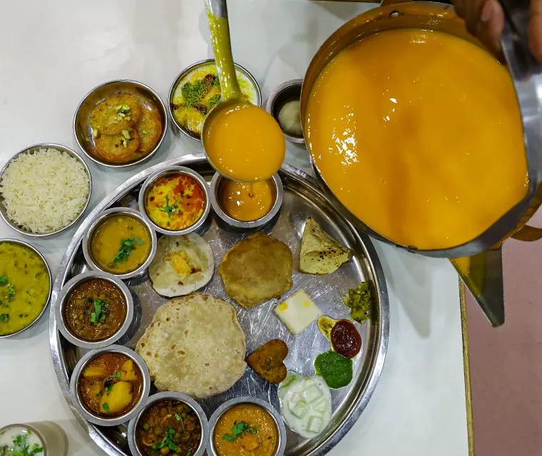 2025's top unlimited Aamras thali restaurants of Pune! Hog on!